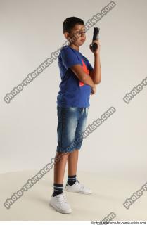 TIMBO STANDING POSE WITH GUN